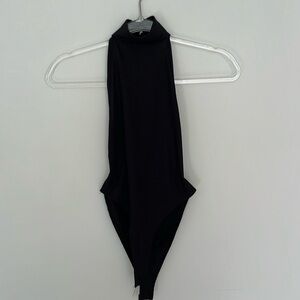 Nasty Gal backless one piece body suit ribbed black snap thong women size 4